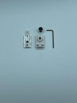 Pièce de rétention pour guide